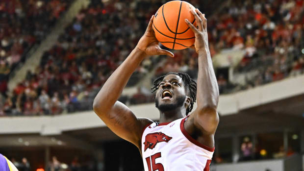 Razorbacks' Makhi Mitchell shooting a layup against Lipscomb in North Little Rock, Ark.